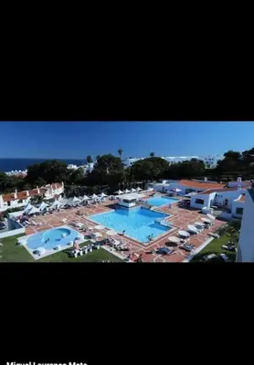 a view of a resort with two swimming pools at Bella Home in Albufeira
