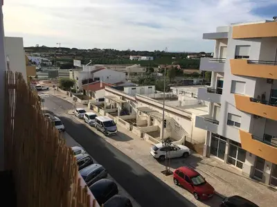 arial view of a parking lot with cars parked on the street at The Luna Apartment Faro - 2 Bedroom Private Apartment in Faro