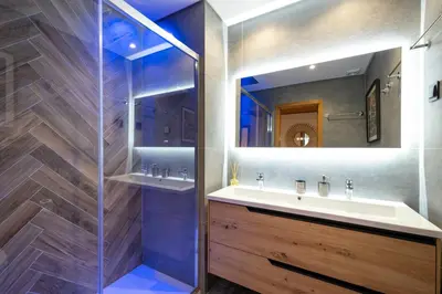a bathroom with a sink and a shower at Romantic with private Hot Tub & Parking - big pool - Marina access in Albufeira