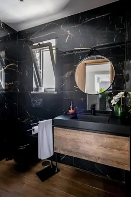 a bathroom with a sink and a mirror at Krystal Bay Villa in Albufeira
