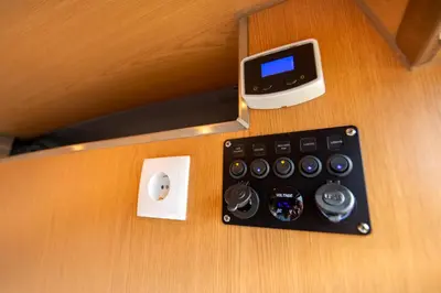 a tea kettle sitting on top of a stove at Ocean Camper - Campervan & Surf rentals in Faro