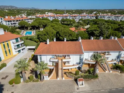 an aerial view of a house with a roof at 5 star Luxury SevenPines apartment with large balcony and 3 communal pool in Quarteira