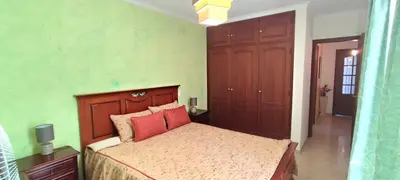 a bedroom with a bed with red pillows at Apt 3 Quartos, Terraço, Centro, Prestige For Home in Loulé