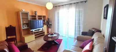 a living room with a couch and a television at Apt 3 Quartos, Terraço, Centro, Prestige For Home in Loulé