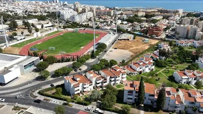 an aerial view of a city with houses at Azure Vilamoura Apartment by HelloVacations in Loulé