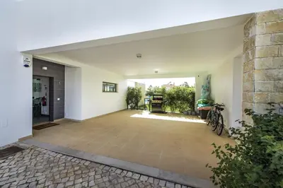 an empty garage with a bike parked in the middle at Blue by Algarve Villa Holidays in Albufeira