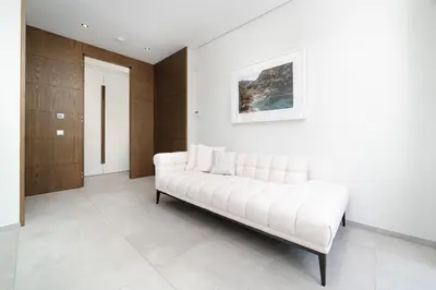 a bathroom with a large mirror and a sink at Villa Sole in Quinta do Lago by LovelyStay in Faro