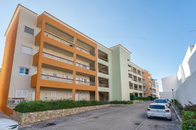 an empty hallway of a building with stairs at BnB Homes Apartment with cozy Terrace & 2 Swimming pools near the heart city in Albufeira