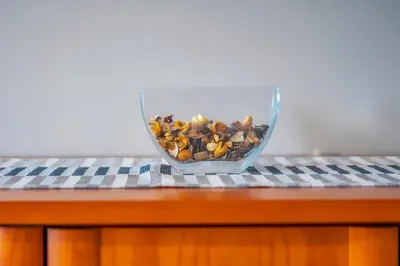 a bowl of seeds sitting on top of a table at Calm Paradise close to the City in Faro