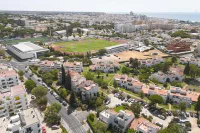 an aerial view of a city with buildings at SeaVillage Asia - City Center by HD in Vilamoura