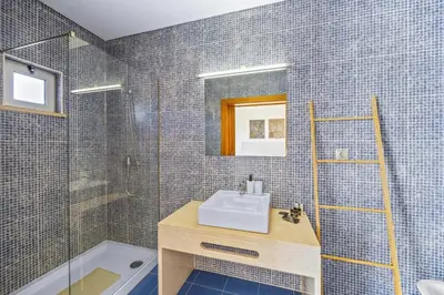 a bathroom with a sink and a shower at Villa Casa Joao by Villa Plus in Albufeira