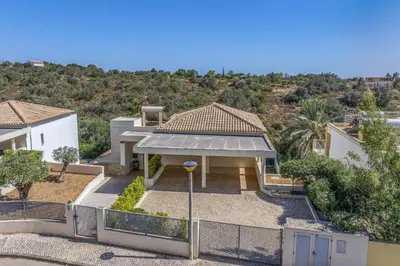 an aerial view of a house with a fence at Villa Casa Petunia by Villa Plus in Albufeira