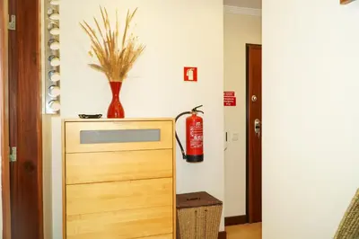 a room with a fire extinguisheracistacistacistacist at Salgados Apartment in Albufeira