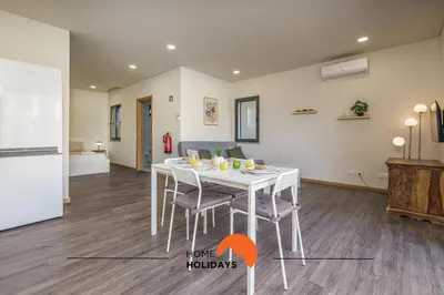 a kitchen sink with a faucet on a counter at #235 New City by Home Holidays in Albufeira