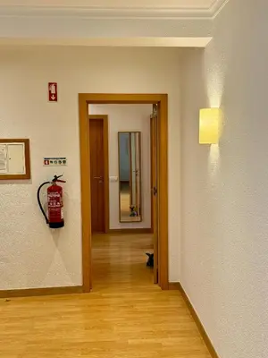 a room with a fire extinguisher on the wall at Fantastic view over the sea in Albufeira