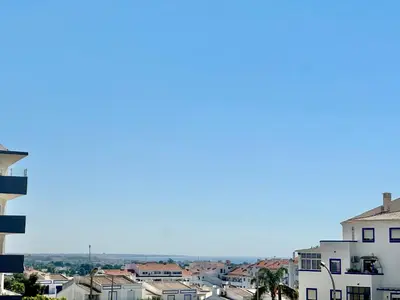a view of a city from a building at Julio Apartment in Albufeira