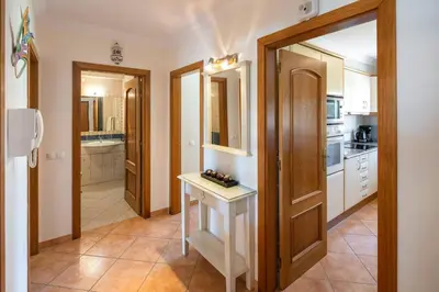 a kitchen with a counter and a sink in it at Lovely 2-Bed Apartment in Sao Rafael in Albufeira