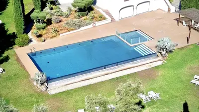 an overhead view of a swimming pool in a yard at Vilamoura Club Villa 1 With Pool by Homing in Vilamoura
