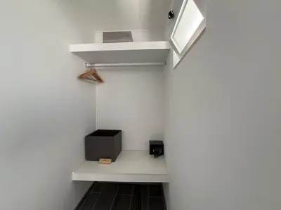 a room with white walls and white shelves at Ocean view by Charmes D in Albufeira