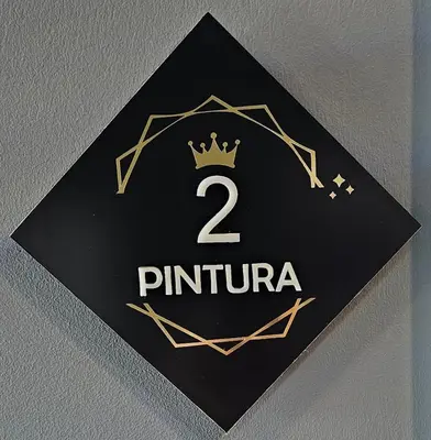 a sign with the number two and a crown on it at Arts by Loulé - Alojamento de Charme in Loulé