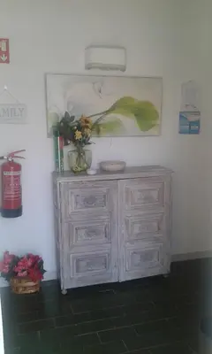 a white dresser with a vase on top of it at Villa Quica, heated pool in Albufeira