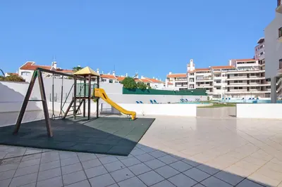 a playground on the roof of a building at Apartamento Sousa e Filhos in Albufeira
