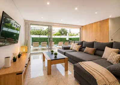 a villa with a swimming pool and a house at Villa MariVital I Luxury I Heated Pool I Old Town in Albufeira