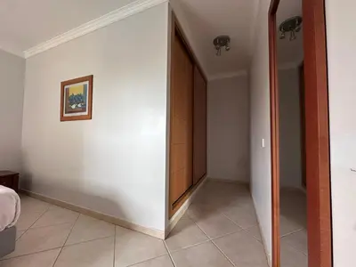a hallway with a door in a room at Oceanview Bliss in Albufeira Retreat Over Oldtown in Albufeira