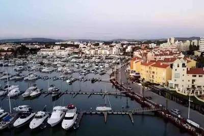 an aerial view of a harbor with boats at Castle House Loulé City Center in Loulé