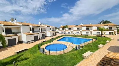 an image of a swimming pool in the yard of a building at Charming 3-Bedroom Villa with Pool in Albufeira in Albufeira