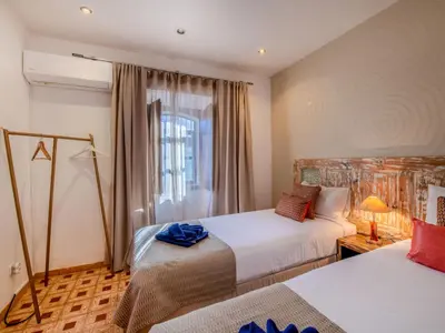 a bedroom with two beds and a window at Holiday Home Rocha by Interhome in Albufeira