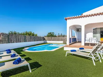 a backyard with a swimming pool and green grass at Holiday Home Antonica by Interhome in Patroves