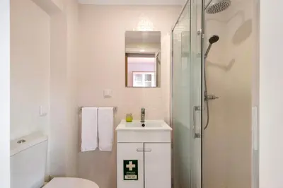 a bathroom with a toilet and a sink and a shower at Cool Motion 2149 in Albufeira