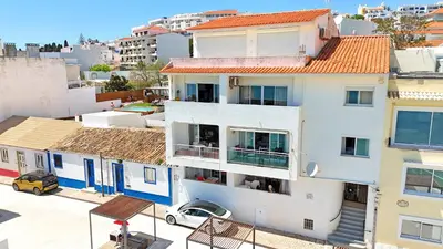 an aerial view of a building in a city at OceanView Apartment by BeCherish in Albufeira