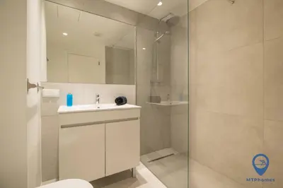 a bathroom with a shower and a toilet and a sink at Vale Mangude B by MTPhomes in Albufeira