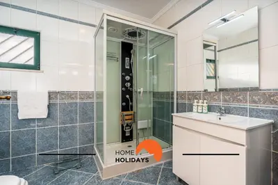 a bathroom with a shower and a sink at #257 Villa Sun & Sea by Home Holidays in Albufeira