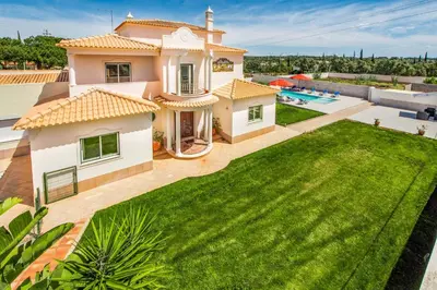 an aerial view of a house with a yard at Villa Dourado in Boliqueime