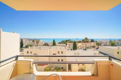a balcony with a view of a city at SeaView apartment by MOJE Holiday in Albufeira