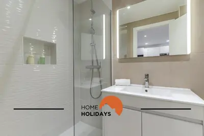 a living room with a couch and a kitchen at #170 Casa do Páteo I com Alpendre by Home Holidays in Albufeira