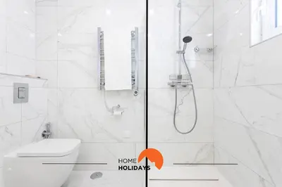 a bathroom with a shower and a toilet at #221 Cerro Grande by Home Holidays in Albufeira