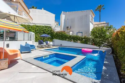 a swimming pool in the backyard of a house at #221 Cerro Grande by Home Holidays in Albufeira