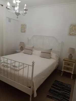 a bathroom with a shower and a toilet and a sink at Beach Falésia in Albufeira