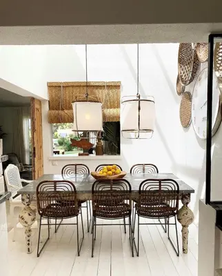 a dining room with a table and chairs at Vilamouratenis White by SAPvillas in Vilamoura