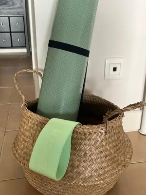 a wicker basket with a green object in it at Casa Algarve in Albufeira