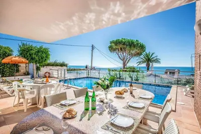 a dining room with a view of the ocean at Atlantic Sul in Albufeira