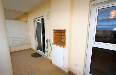 a room with a large window and a door at Antelius 82 - Clever Details in Vilamoura