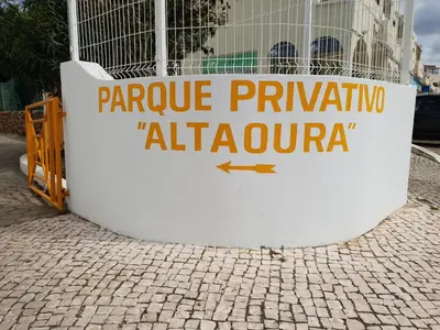 a sign that reads parrovincial albuquerque on a wall at Alta Oura in Albufeira