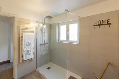 a bedroom with a bed with a canopy at Quinta do Lago, Charme e Luxo no Centro da Quinta do Lago, 5 Quartos in Quinta do Lago