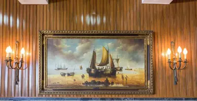 a painting of a painting of boats on a wall at Residencial Miramar in Quarteira