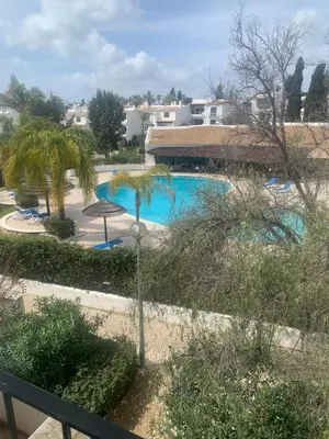a view of a swimming pool in a resort at Apartamento Perfect Holidays in Albufeira